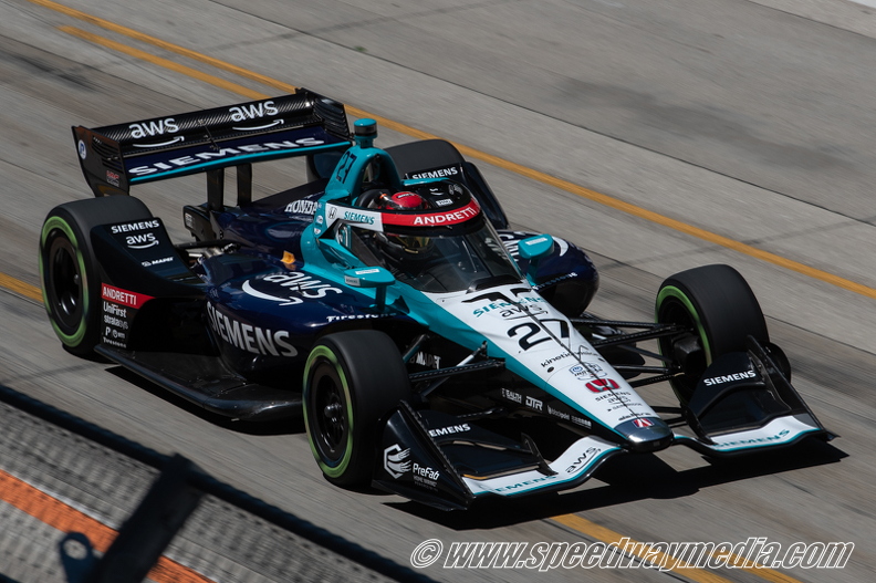 Kyle Kirkwood pulls off winning move with damaged car