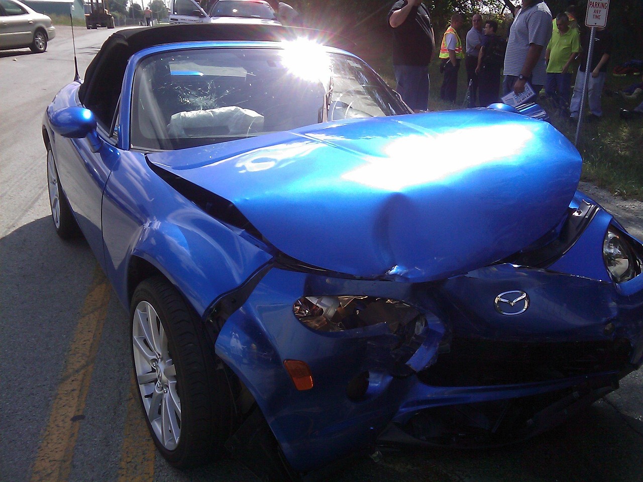 Blue crashed car