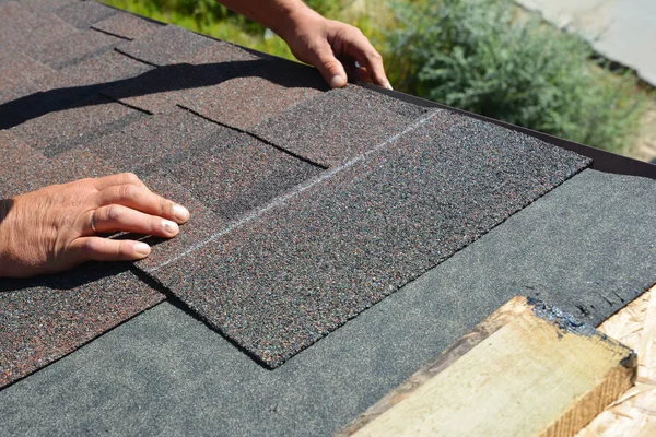 depositphotos_311522526-stock-photo-asphalt-shingles-installation-roofer-contractor (1)