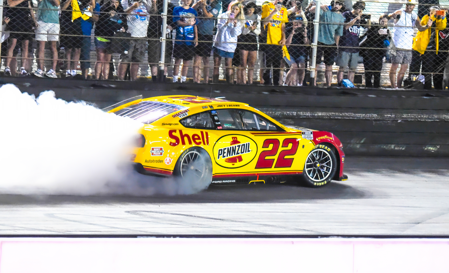 Joey Logano sneaks through for wild Bristol Night Race victory Joey Logano sneaks through for wild Bristol Night Race victory